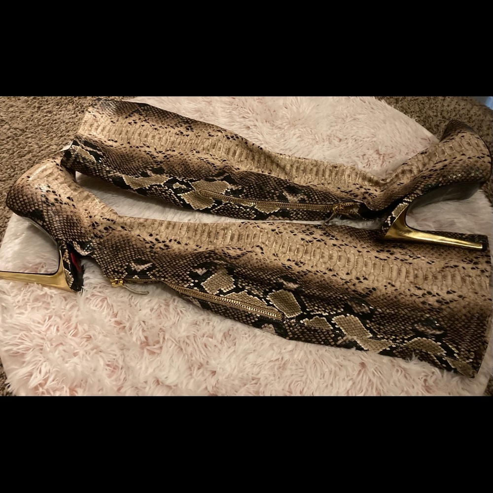 Snakeskin thigh high boots